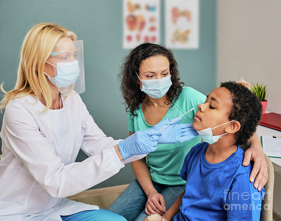 Doctor Taking Nasal Swab #1 by Peakstock / Science Photo Library