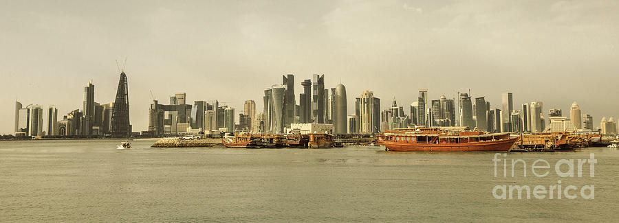 Doha skyline and dhows #1 Photograph by Benny Marty