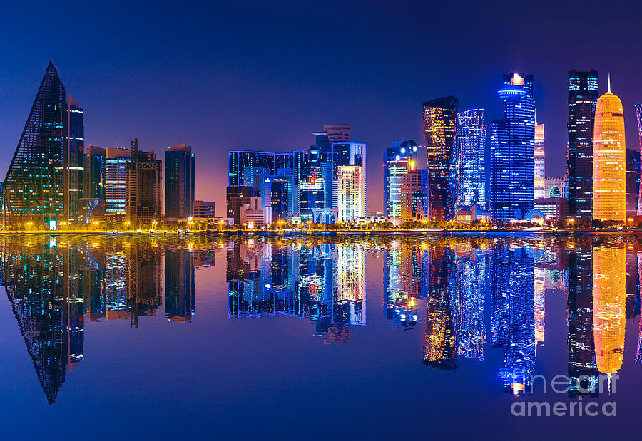 Doha skyline reflection night #1 Photograph by Benny Marty
