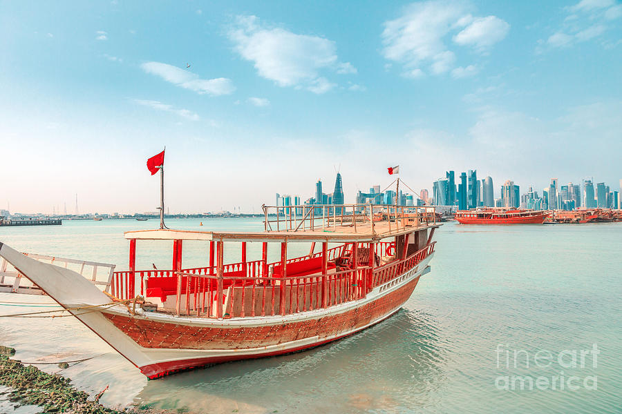 Doha skyline with dhow #1 Photograph by Benny Marty