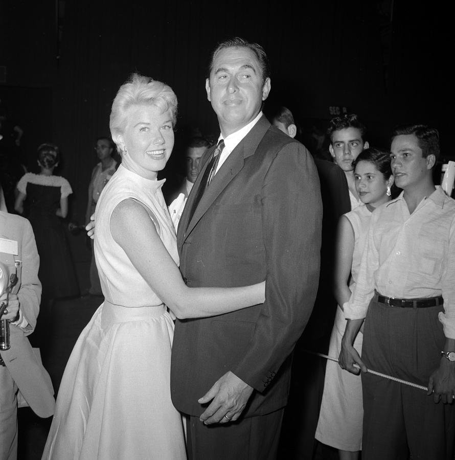 Doris Day With Her Arms Around A Man's Photograph by Frank Worth - Pixels