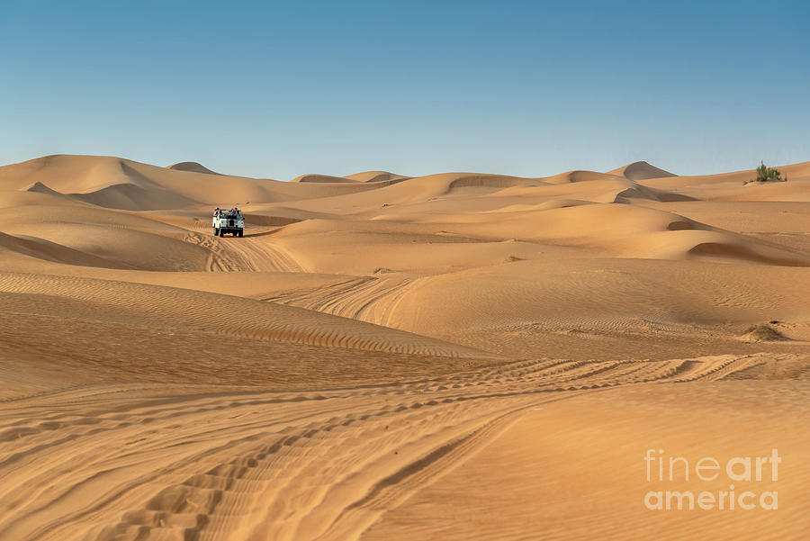 Driving in the sand dunes, Dubai desert Photograph by Delphimages Photo Creations Pixels