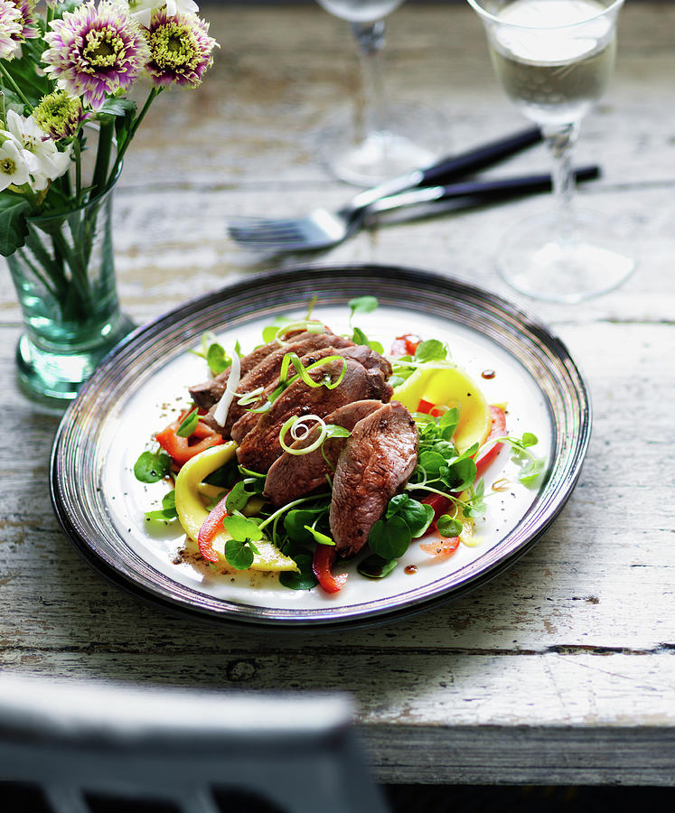 Duck Breast On Mango And Pepper Salad With Watercress And Spring Onions #1 Photograph by Karen Thomas