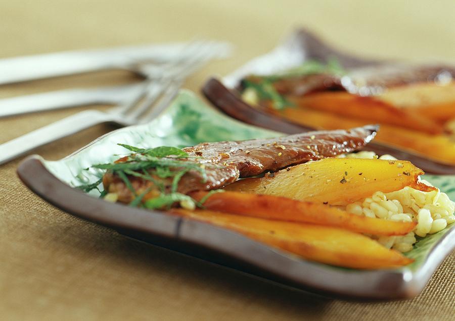 Duck Fillets With Wheat And Mango #1 Photograph by Bono