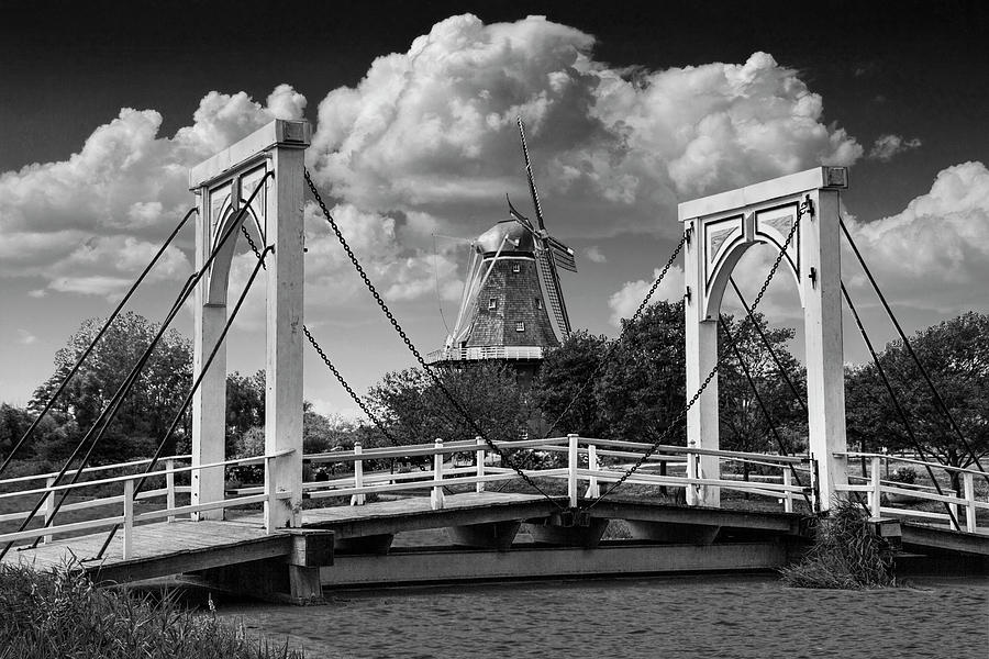 Dutch Bridge and the deZwaan Windmill at Windmill Island in Holl #1 Photograph by Randall Nyhof