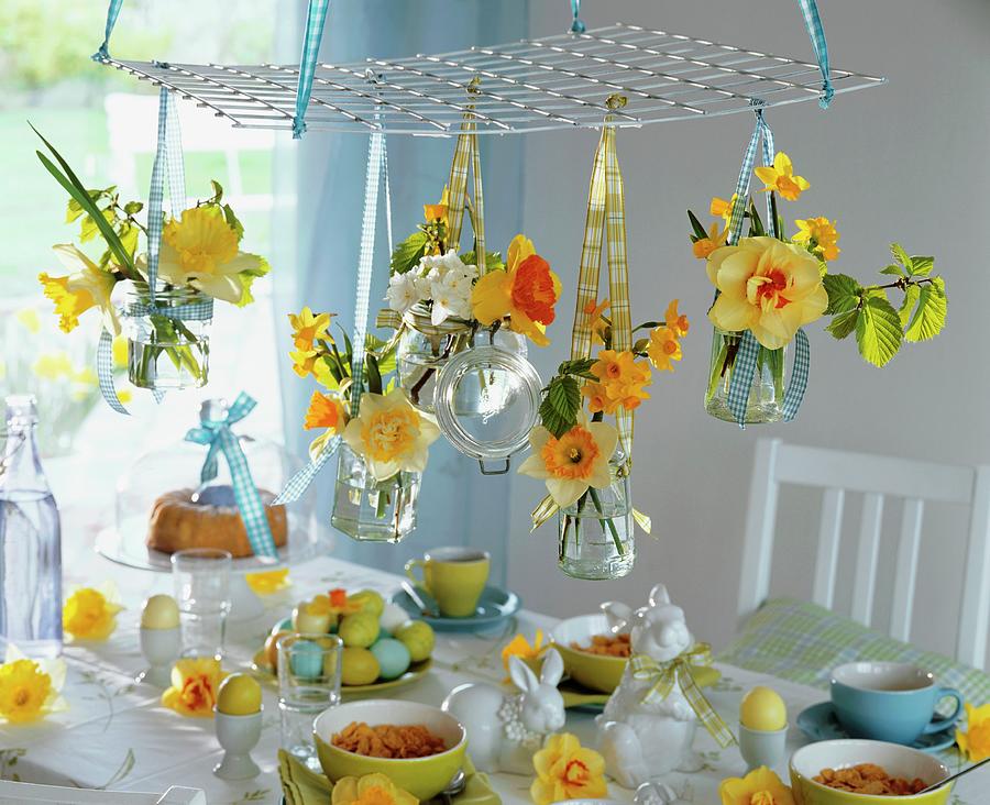 Easter Breakfast Table Decorated With Narcissi #1 Photograph by Friedrich Strauss
