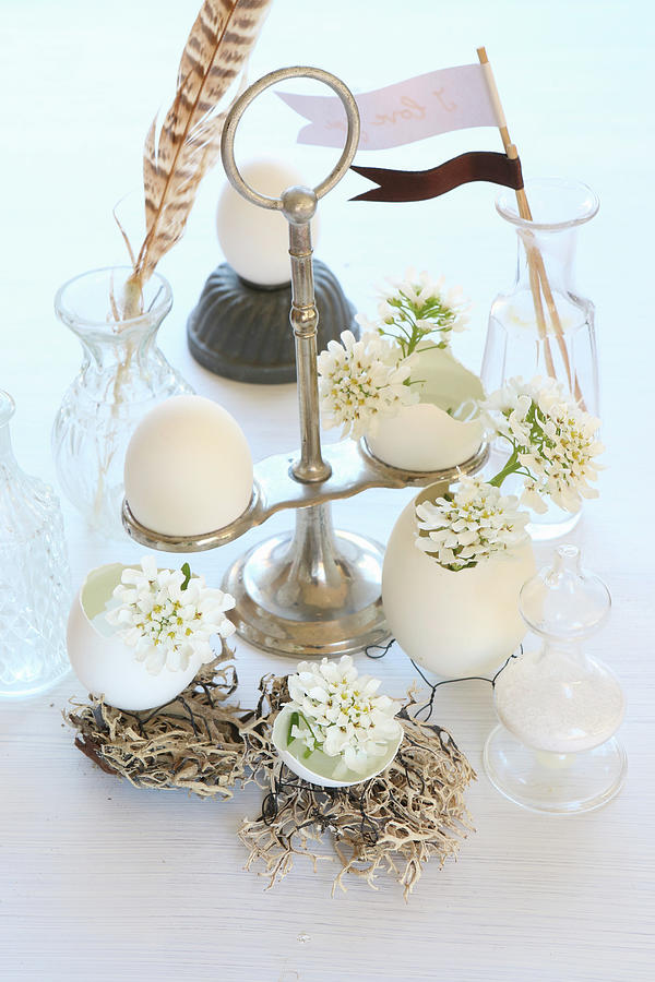 Egg Shells On Wire Bases Used As Vases For Tiny White Flowers #1 Photograph by Regina Hippel