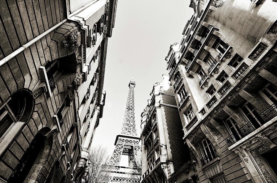 Eiffel Tower  Between Buildings In Photograph by Flory