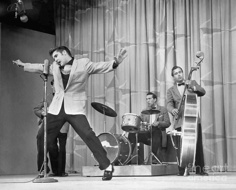 Elvis Presley Photograph - Elvis Presley Performing On Stage #1 by Bettmann