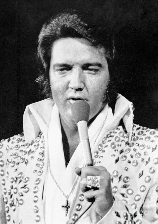 Elvis Presley Singing In Concert #1 Photograph by Bettmann