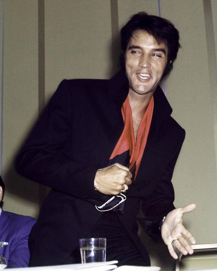 Elvis Presley Smiling During A Press Conference Photograph by Globe ...