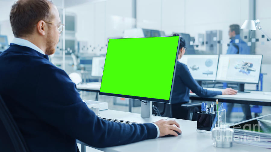 Engineer Using A Green Screen #1 Photograph by Gorodenkoff Productions/science Photo Library