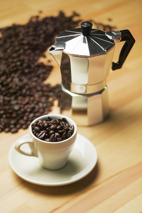 Espresso Coffee Maker And Coffee Beans #1 Photograph by Lucidio Studio, Inc.