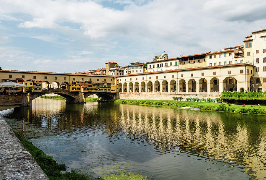 Famous Ponte Vecchio bridge in Florence, Italy #1 Photograph by Tosca Weijers