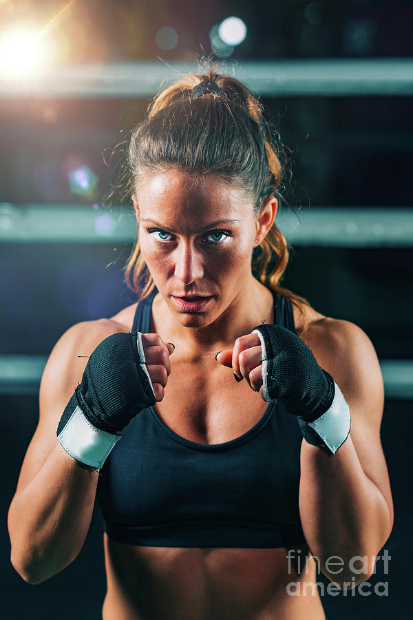 Angry Muay Thai Female Boxer In Attack Pose. Fitness Young Woman Boxing  Training On Black Background, Closeup Monochrome Stock Photo, Picture and  Royalty Free Image. Image 177298280.