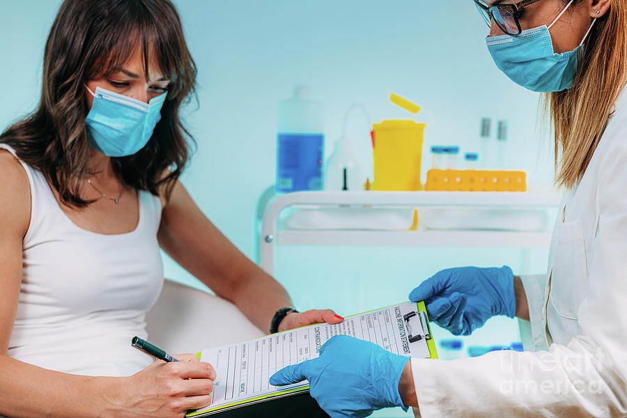 Female Patient Filling In Vaccine Information Statement #1 Photograph by Science Photo Library Female Patient Filling In Vaccine Information Statement #1 Photograph by Science Photo Library