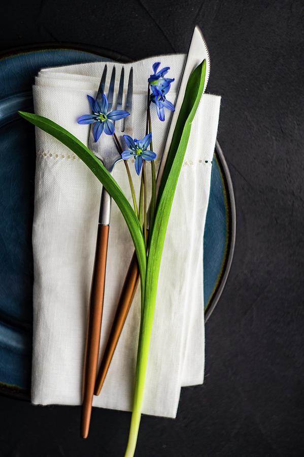Festive Table Setting With Scilla Flowers For Easter Holiday Dinner #1 Photograph by Anna Bogush
