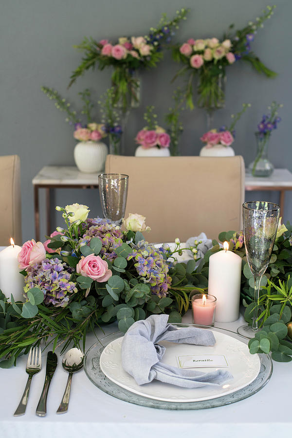 Festively Decorated Table With Lavish Floral Garland As Centrepiece Photograph By Great Stock