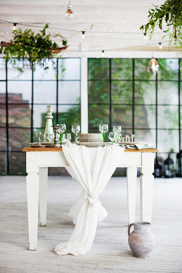 Festively Set Country-house Table In Industrial Building #1 Photograph by Alicja Koll