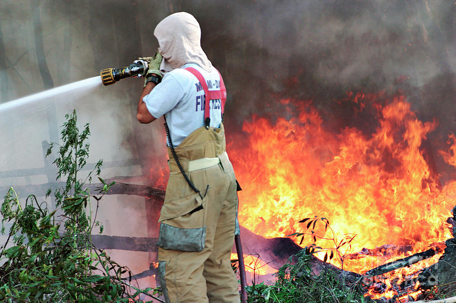 Firemen Spraying Water At Trees #1 Photograph by Jeffrey Greenberg/uig/science Photo Library