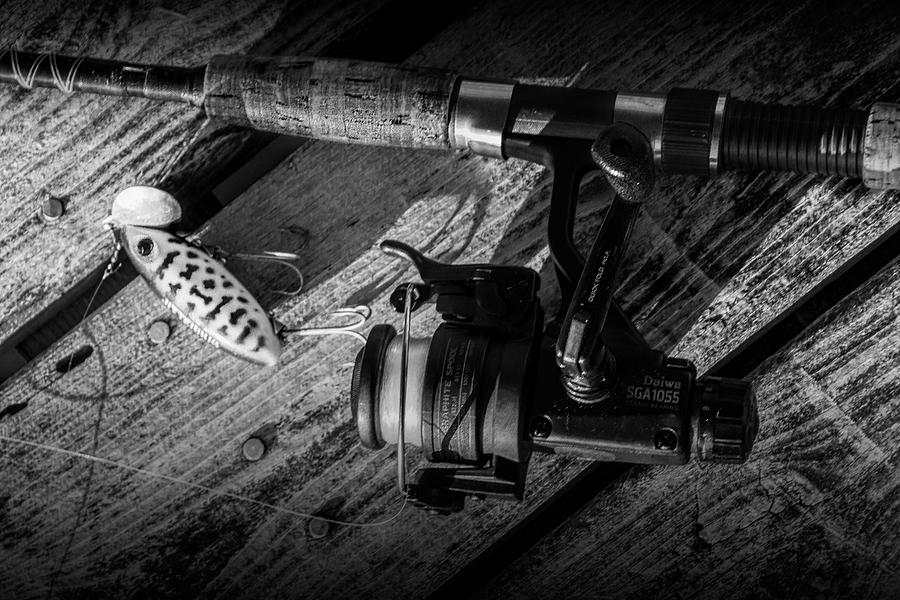 Fishing Rod with Spinning Reel and Jitterbug Crank Bait on a Boa #1  Photograph by Randall Nyhof - Fine Art America
