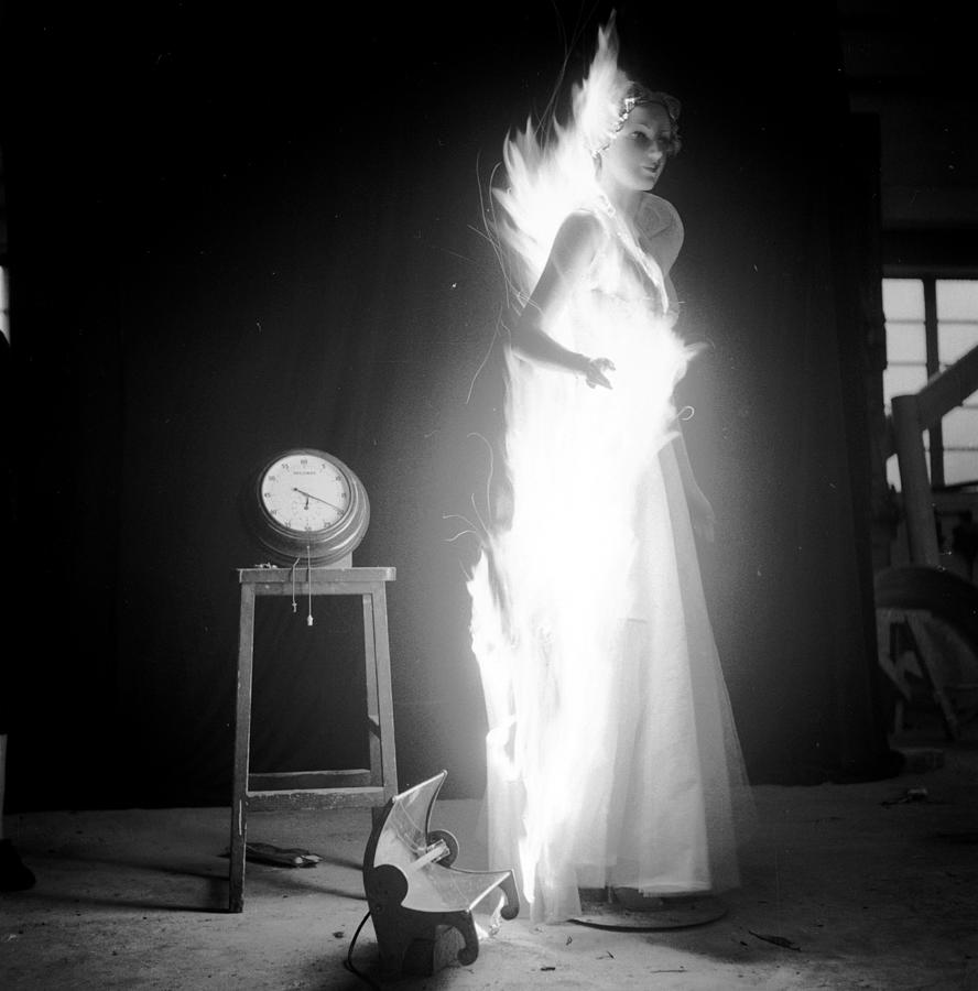 Flaming Clothes #1 Photograph by John Chillingworth