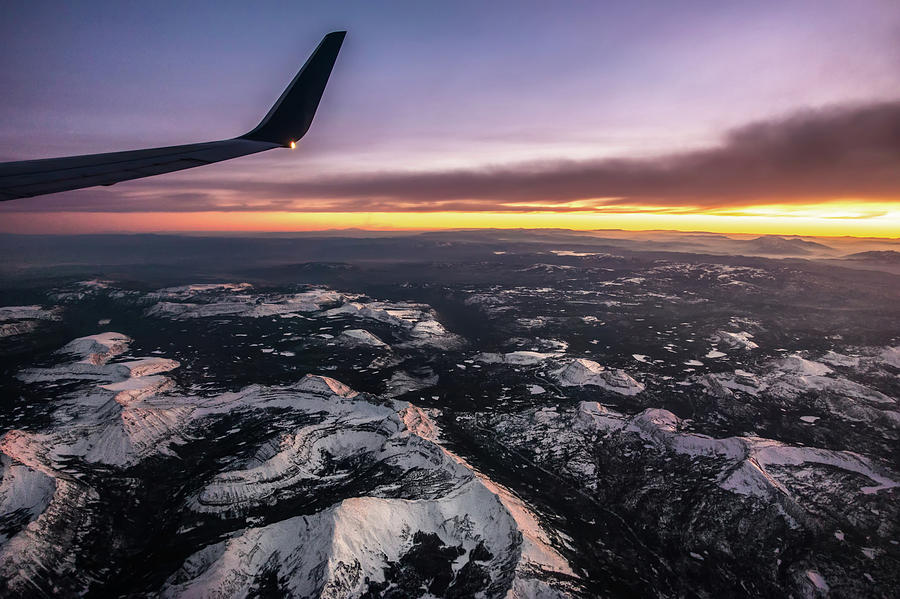 Flying over colorado rocky mountains at sunset #1 Photograph by Alex Grichenko