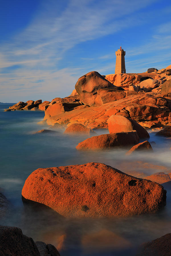 France, Brittany, Atlantic Ocean, English Channel, Cotes-darmor, Cote De Granit Rose, Ploumanach, Pink Granite Coast, Mean Ruz Lighthouse And Rock Formations In The Late Afternoon Light #1 Digital Art by Riccardo Spila