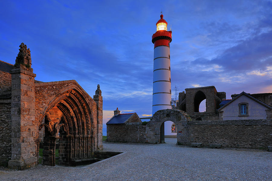 France, Brittany, Atlantic Ocean, Finistere, Coast, Brest, View Of The Pointe De Saint Mathieu Lighthouse And The Abbey Ruins, Located Near Le Conquet Village On The Brest Harbor #1 Digital Art by Riccardo Spila