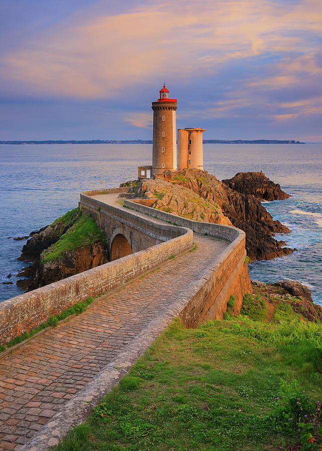 France, Brittany, Atlantic Ocean, Finistere, Plouzane, View Of Petit Minou Lighthouse, Located Along The Brest Harbor, In The Warm Light Of Sunset #1 Digital Art by Riccardo Spila