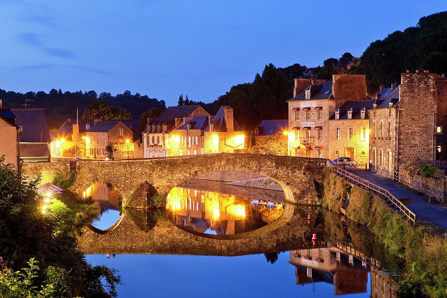 France, Brittany, Cotes-darmor, Dinan, View Over The Old Town And Rance River Illuminated At Dusk #1 Digital Art by Luigi Vaccarella