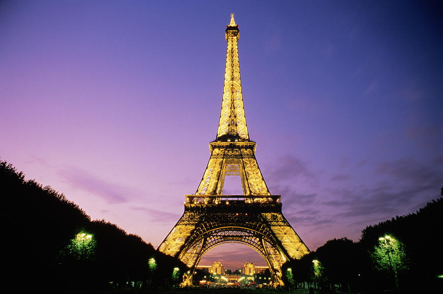 France,paris,eiffel Tower Illuminated Photograph By Roger Wright