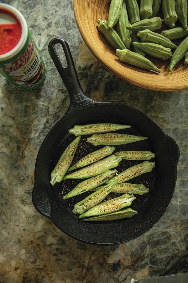 Fried Okra Halves In A Cast Iron Pan #1 Photograph by Cindy Haigwood