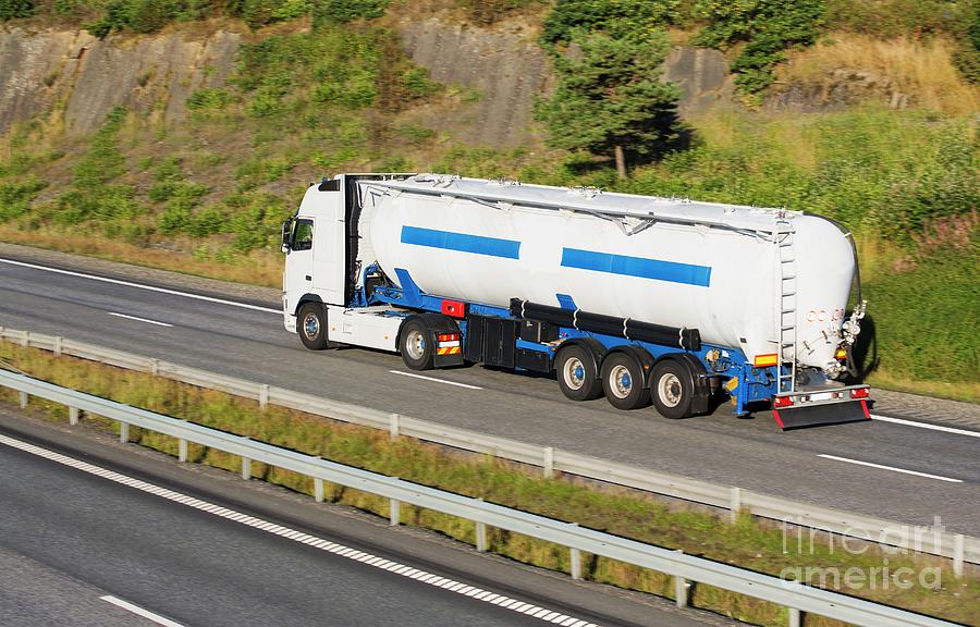 Fuel Tanker On Highway Photograph by Christian Lagerek/science Photo ...