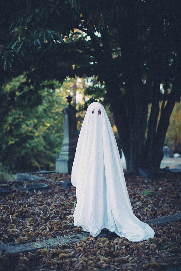 Full Length Portrait Of Boy Wearing Ghost Costume While Standing On ...