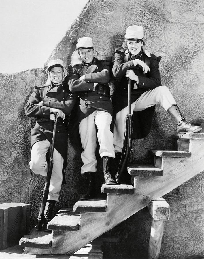 GARY COOPER , RAY MILLAND and ROBERT PRESTON in BEAU GESTE -1939-. #1 Photograph by Album