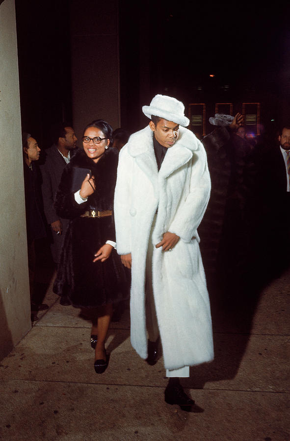 Gaudily Dressed Boxing Fans Arriving Photograph by Bill Ray