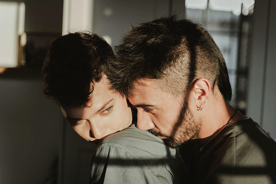 Gay Boy Couple Hugging In The Room. Lgbt Photograph by Cavan Images - Pixels