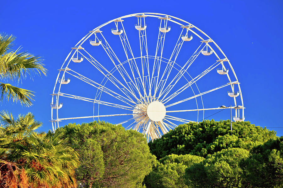 Nature Photograph - Giant Ferris wheel in Antibes colorful view #1 by Brch Photography