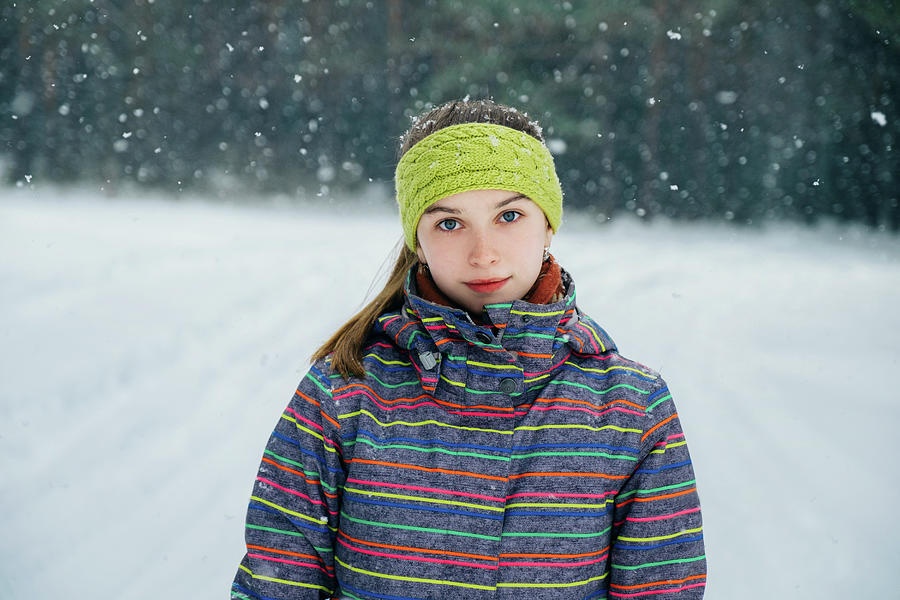 Girl Standing In A Snowy Forest Photograph by Cavan Images - Fine Art ...