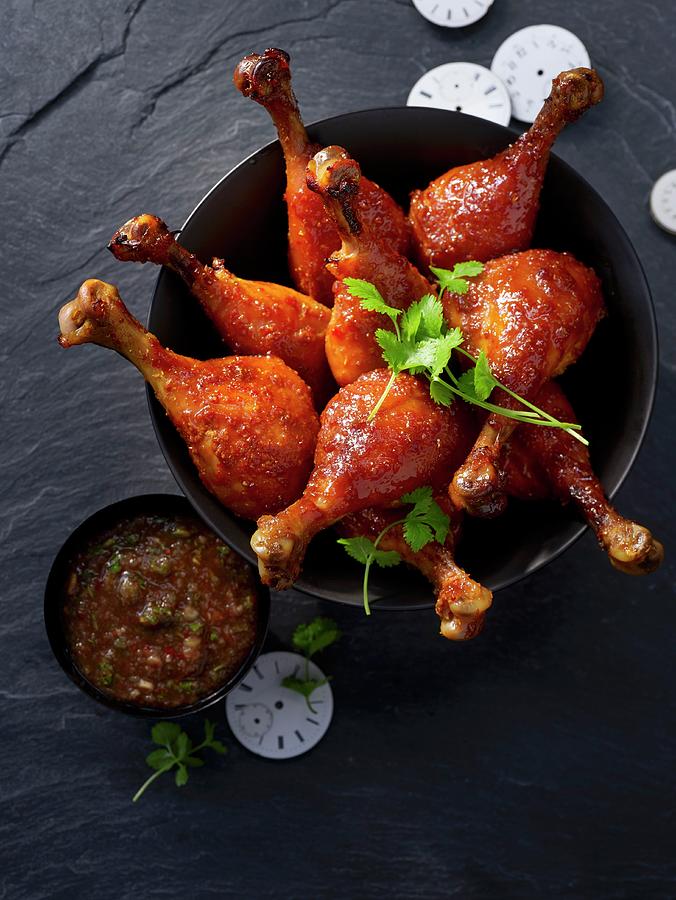 Glazed Corn Fed Chicken Drumsticks With A Tamarind Dip #1 Photograph by Jan-peter Westermann