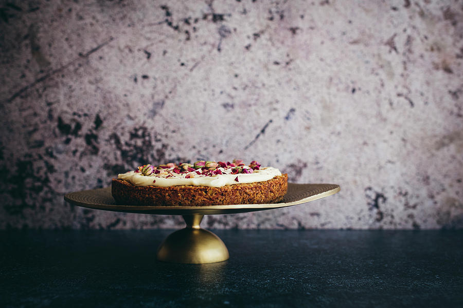 Gluten-free Carrot Cake With Tahini Glaze And Rose Petal Decoration #1 Photograph by Hein Van Tonder