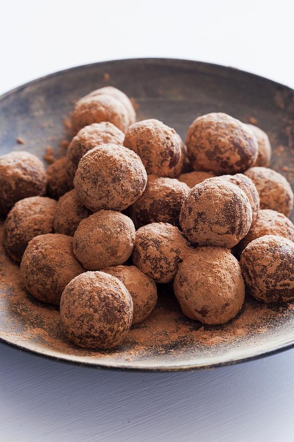 Gold And Chocolate Dusted Bourbon Balls #1 Photograph by Jennifer Martine