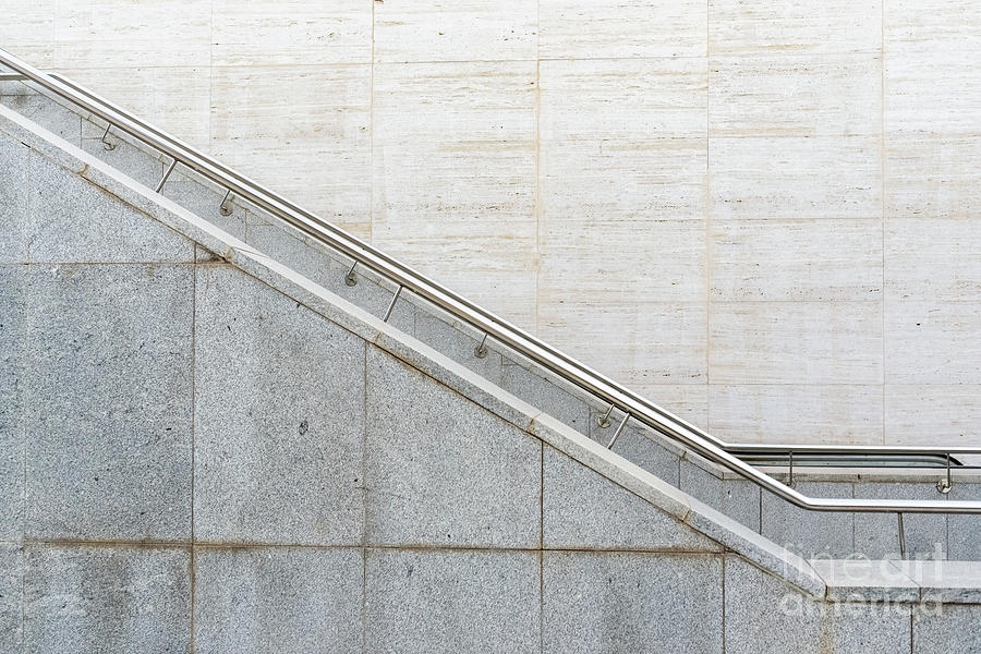 Granite staircase with handrails at the entrance of an underground pedestrian tunnel. #1 Photograph by Joaquin Corbalan