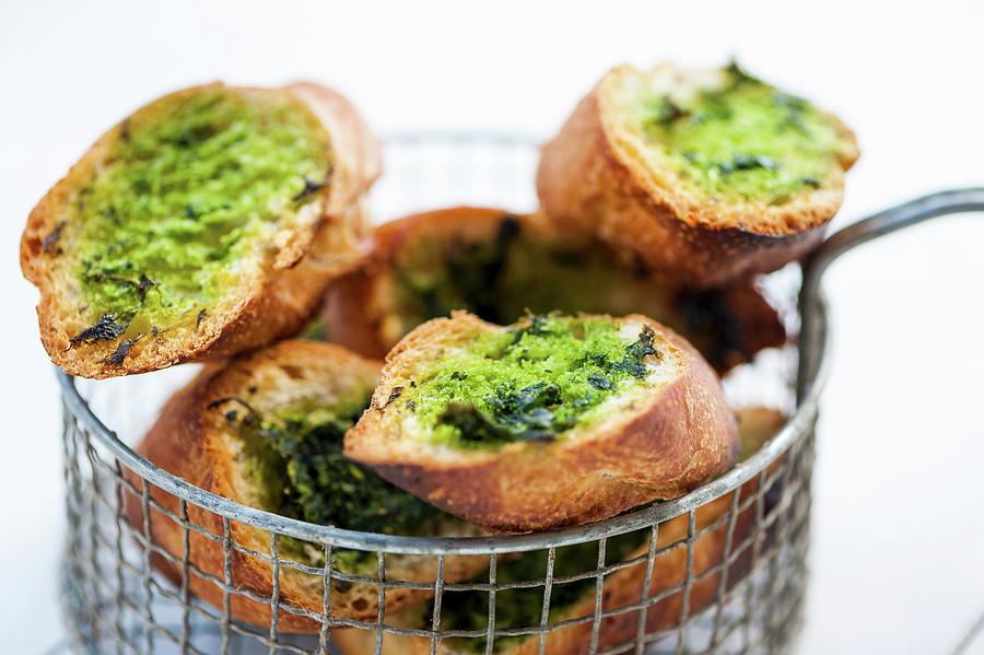 Grilled Baguette Slices With Wild Garlic Pesto #1 Photograph by Gabriela Lupu