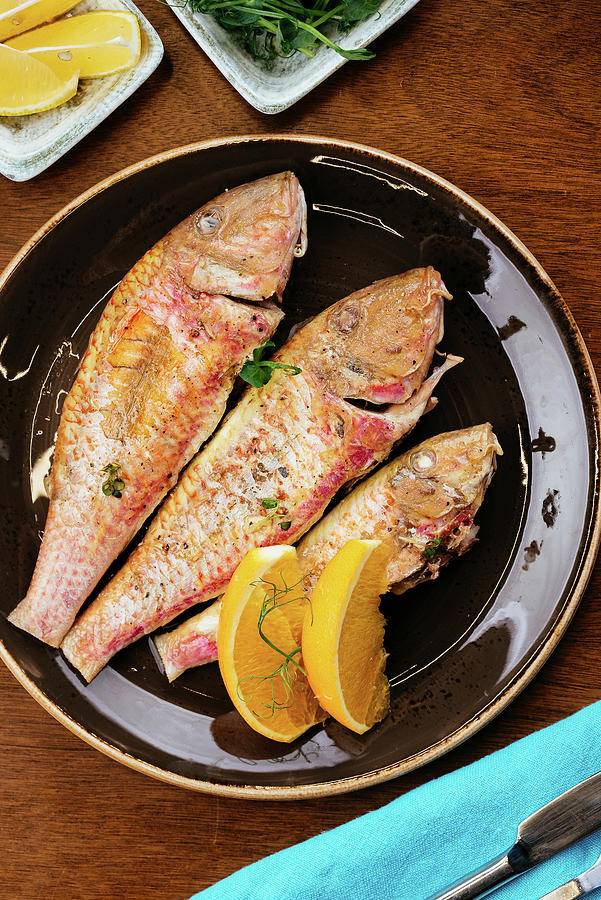 Grilled Fish With Herbs And Lemon #1 Photograph by Kuzmin5d