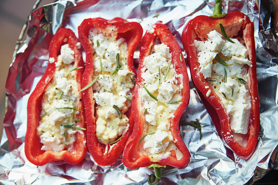 Grilled Red Pointed Peppers Filled With Feta Cheese And Rosemary #1 Photograph by Brigitte Sporrer