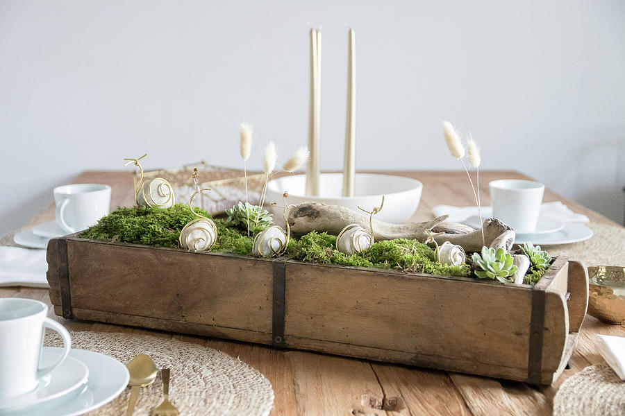 Handmade Table Centrepiece With Snails Made From Pebbles And Wire #1 Photograph by Astrid Algermissen