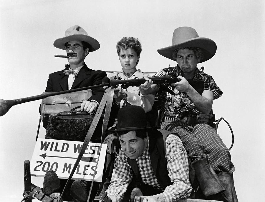 HARPO MARX , THE MARX BROTHERS , CHICO MARX , GROUCHO MARX and DIANA LEWIS in GO WEST -1940-. #1 Photograph by Album