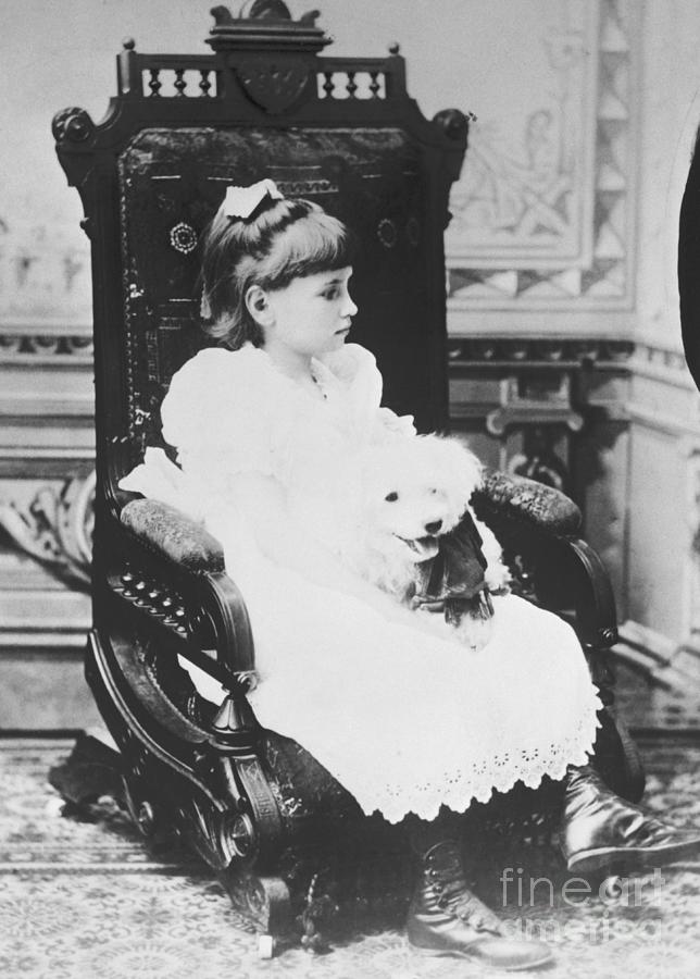 Helen Keller Holding Pet Poodle In Chair #1 Photograph by Bettmann